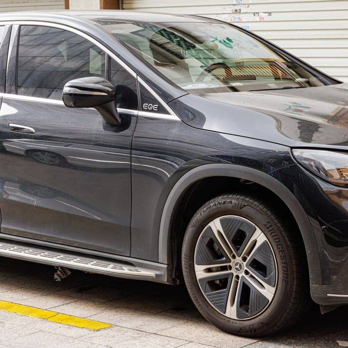 Mercedes EQE electric SUV by the ocean in Nassau